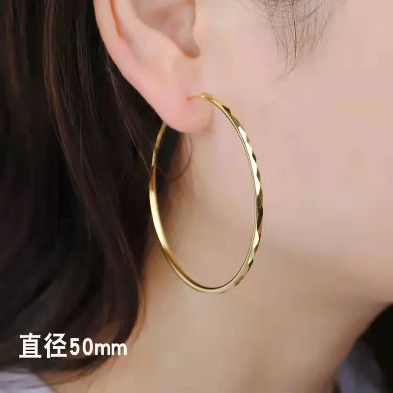 grandes boucles d'oreilles créoles pour femmes