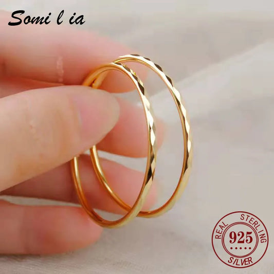 grandes boucles d'oreilles créoles pour femmes